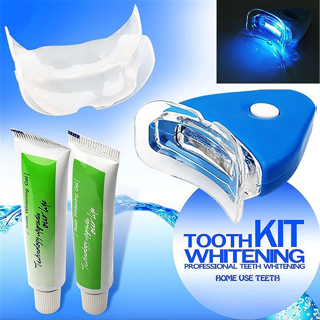 Professional teeth whitening kit with LED light device and two tubes of whitening gel.