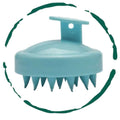 Light blue hair scalp massager brush designed for scalp massage benefits and improved circulation.