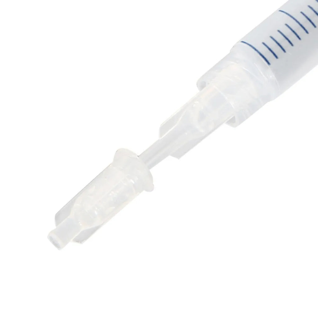 Close up of whitening gel syringe applicator tip