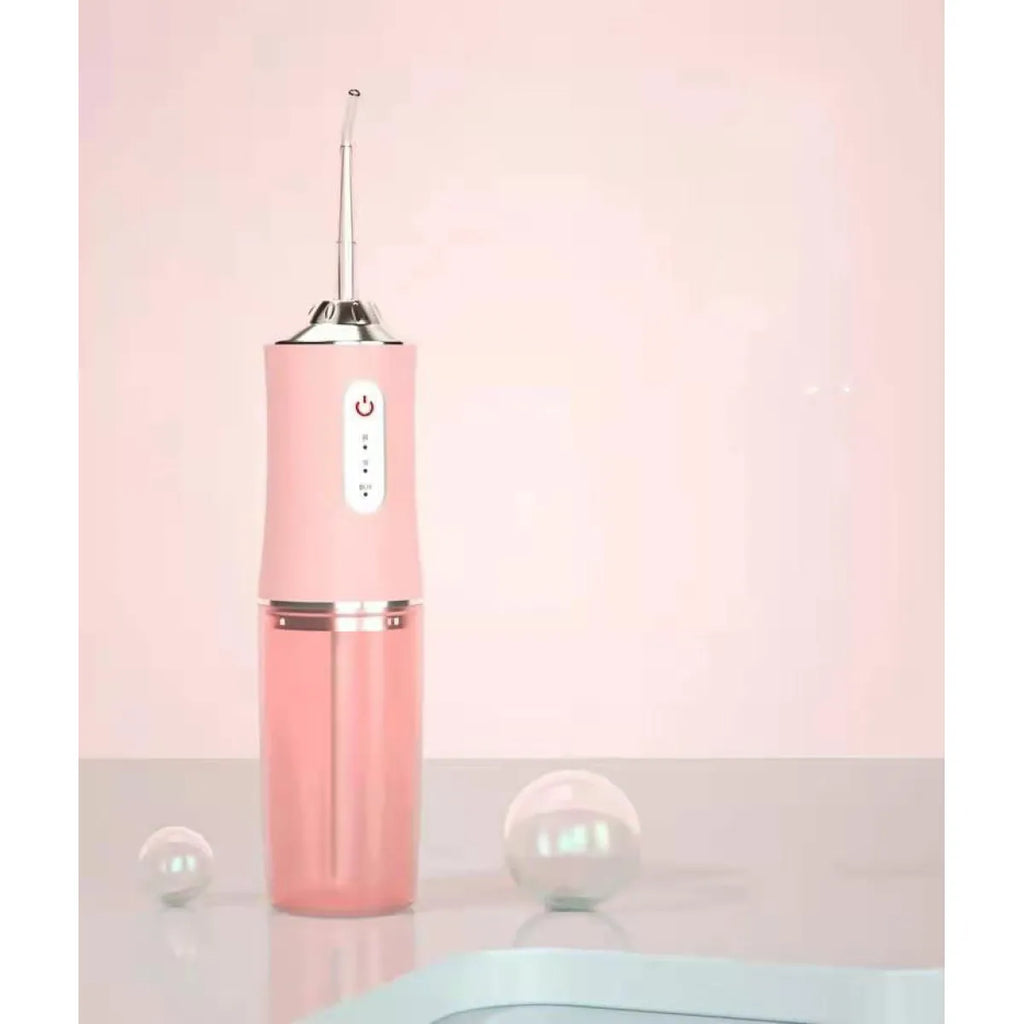 Pink cordless water flosser